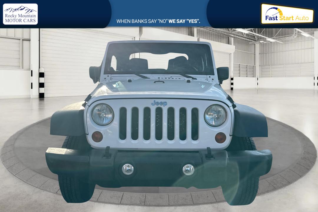 2012 White Jeep Wrangler Sport 4WD (1C4AJWAG0CL) with an 3.6L V6 DOHC 24V FFV engine, Automatic, 5-Spd transmission, located at 767 S State Road, Pleasant Grove, UT, 84062, (801) 785-1058, 40.354839, -111.736687 - Photo#7