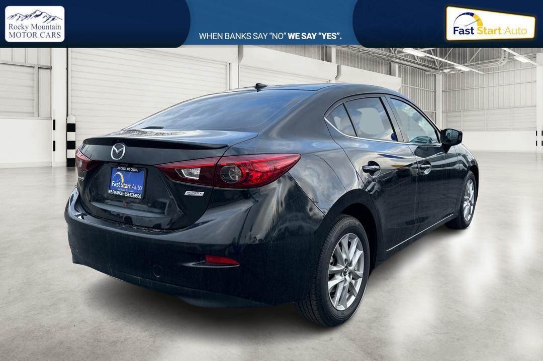 2016 Black Mazda MAZDA3 i Grand Touring MT 4-Door (JM1BM1W79G1) with an 2.0L L4 DOHC 16V engine, 6M transmission, located at 7755 State Street, Midvale, UT, 84047, (801) 753-9063, 40.610329, -111.892159 - Photo#2