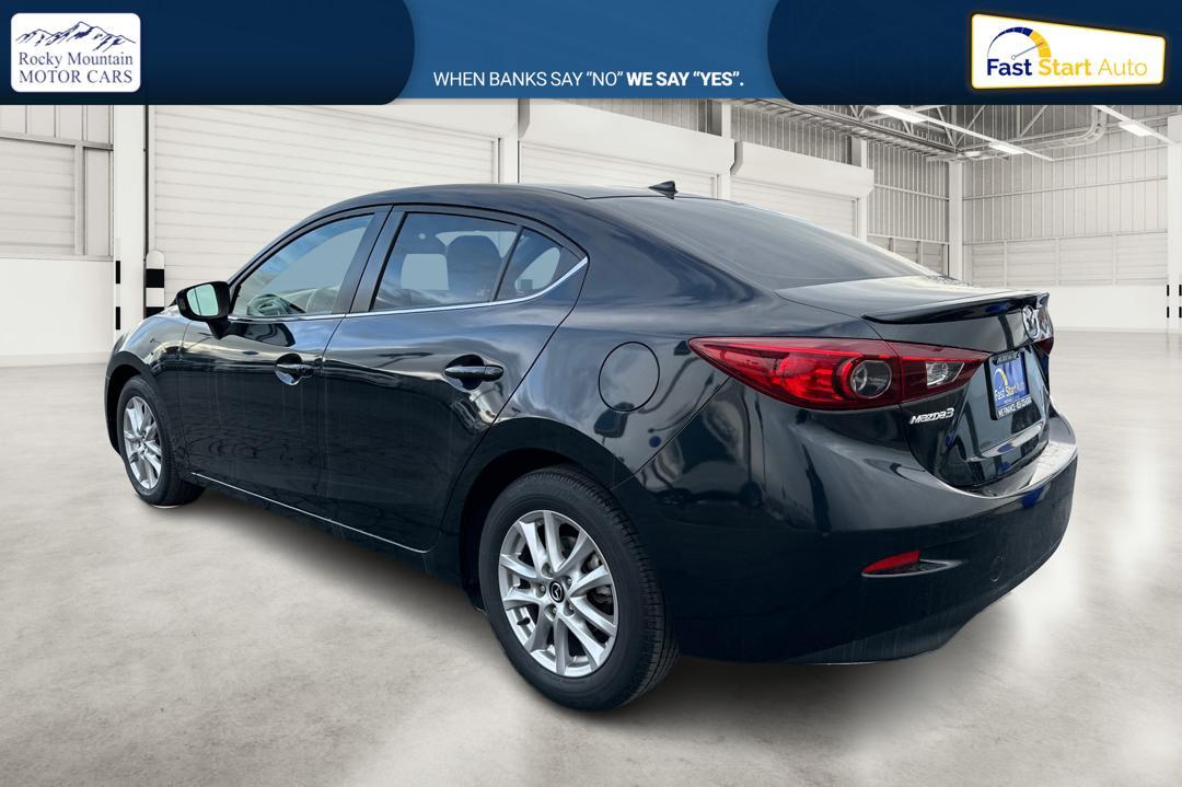 2016 Black Mazda MAZDA3 i Grand Touring MT 4-Door (JM1BM1W79G1) with an 2.0L L4 DOHC 16V engine, 6M transmission, located at 7755 State Street, Midvale, UT, 84047, (801) 753-9063, 40.610329, -111.892159 - Photo#5