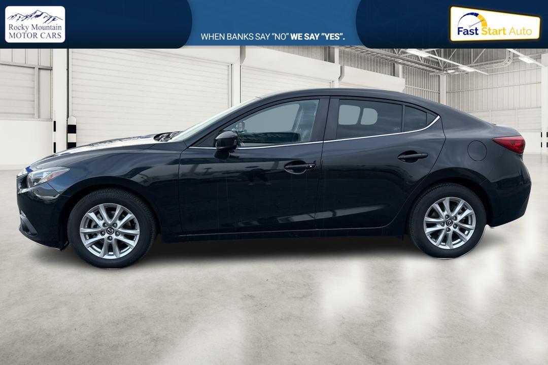 2016 Black Mazda MAZDA3 i Grand Touring MT 4-Door (JM1BM1W79G1) with an 2.0L L4 DOHC 16V engine, 6M transmission, located at 7755 State Street, Midvale, UT, 84047, (801) 753-9063, 40.610329, -111.892159 - Photo#6