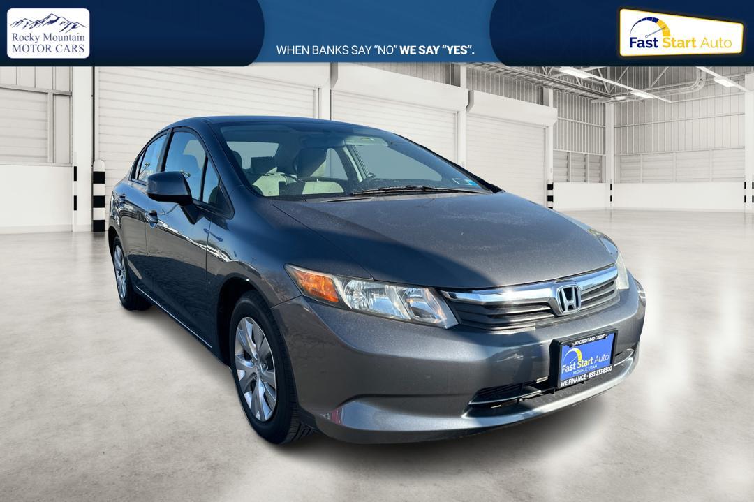 2012 Gray Honda Civic LX Sedan 5-Speed MT (2HGFB2E59CH) with an 1.8L L4 SOHC 16V engine, 5-Speed Manual transmission, located at 7755 State Street, Midvale, UT, 84047, (801) 753-9063, 40.610329, -111.890656 - Photo#0