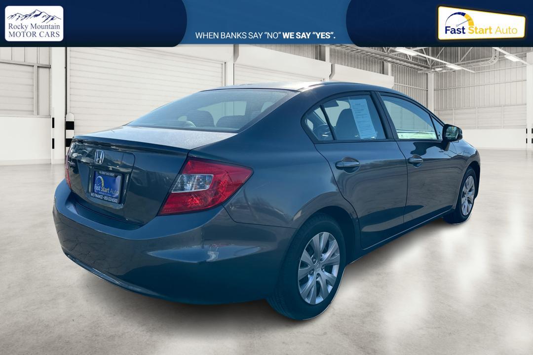 2012 Gray Honda Civic LX Sedan 5-Speed MT (2HGFB2E59CH) with an 1.8L L4 SOHC 16V engine, 5-Speed Manual transmission, located at 7755 State Street, Midvale, UT, 84047, (801) 753-9063, 40.610329, -111.890656 - Photo#2