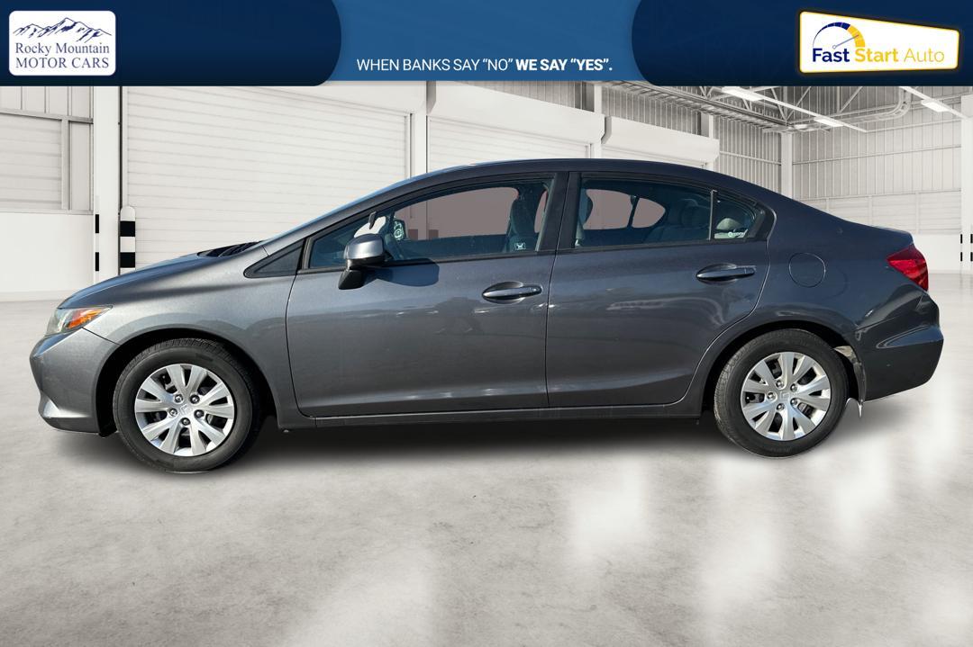 2012 Gray Honda Civic LX Sedan 5-Speed MT (2HGFB2E59CH) with an 1.8L L4 SOHC 16V engine, 5-Speed Manual transmission, located at 7755 State Street, Midvale, UT, 84047, (801) 753-9063, 40.610329, -111.890656 - Photo#6