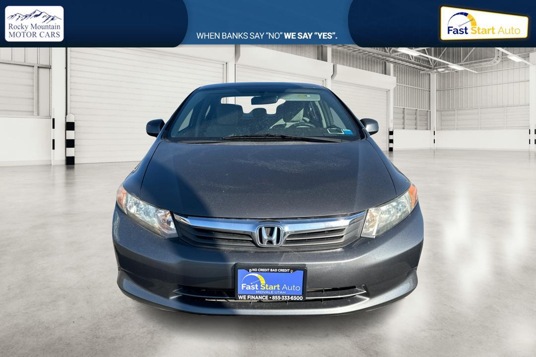 2012 Gray Honda Civic LX Sedan 5-Speed MT (2HGFB2E59CH) with an 1.8L L4 SOHC 16V engine, 5-Speed Manual transmission, located at 7755 State Street, Midvale, UT, 84047, (801) 753-9063, 40.610329, -111.890656 - Photo#9