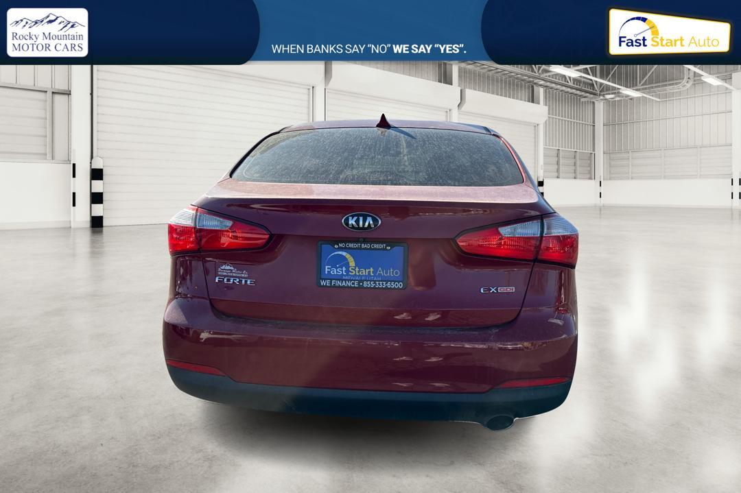 2016 Red Kia Forte EX (KNAFZ4A84G5) with an 2.0L L4 DOHC 16V engine, 6A transmission, located at 7755 State Street, Midvale, UT, 84047, (801) 753-9063, 40.610329, -111.890656 - Photo#4