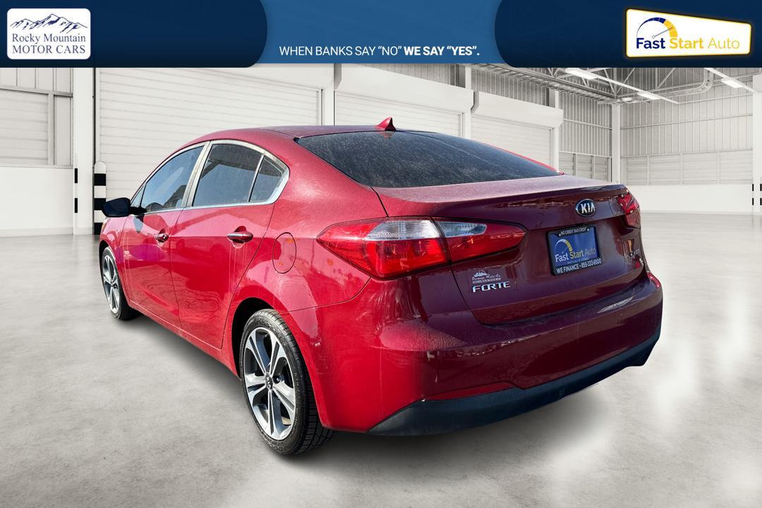 2016 Red Kia Forte EX (KNAFZ4A84G5) with an 2.0L L4 DOHC 16V engine, 6A transmission, located at 7755 State Street, Midvale, UT, 84047, (801) 753-9063, 40.610329, -111.890656 - Photo#5