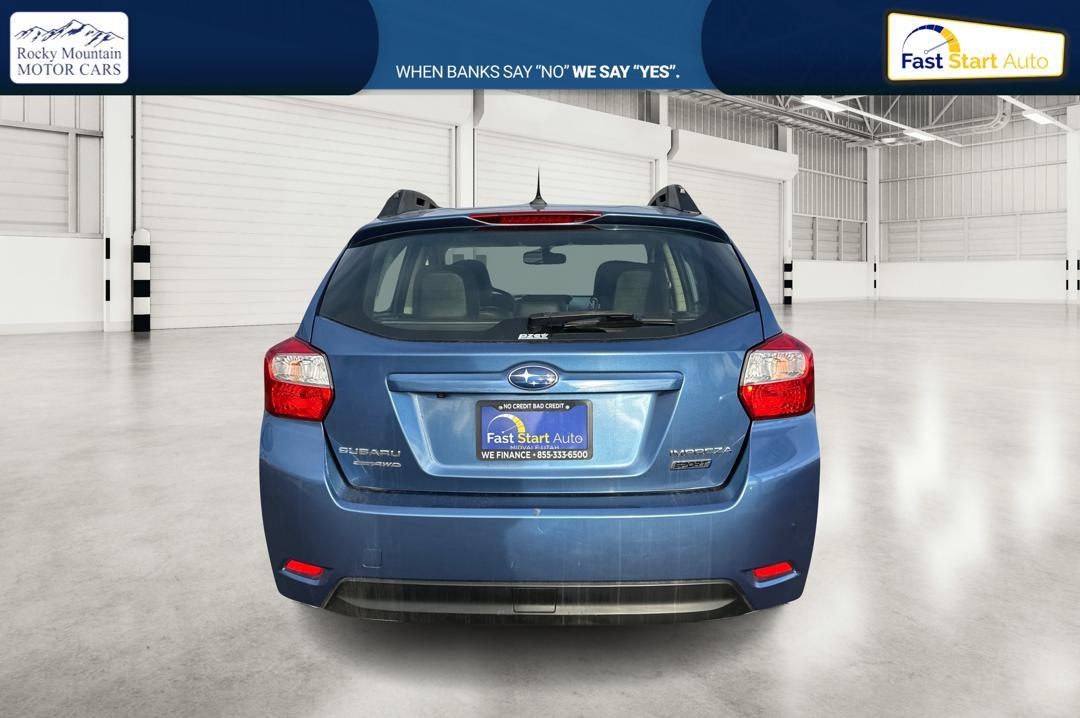 2015 Blue Subaru Impreza 2.0i Sport Limited PZEV 5-Door (JF1GPAW69F8) with an 2.0L H4 DOHC 16V engine, Continuously Variable Transmission transmission, located at 7755 State Street, Midvale, UT, 84047, (801) 753-9063, 40.610329, -111.892159 - Photo#4