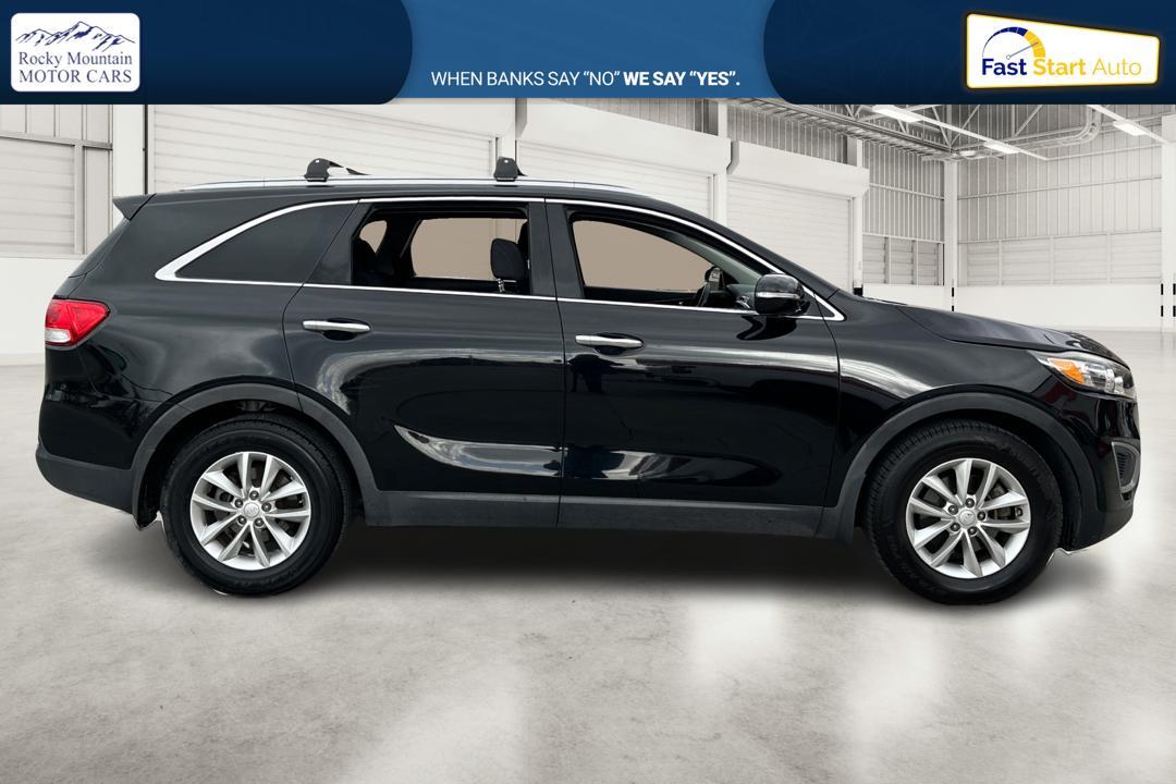 2017 Black Kia Sorento LX V6 2WD (5XYPG4A54HG) with an 3.3L V6 DOHC 24V engine, 6A transmission, located at 767 S State Road, Pleasant Grove, UT, 84062, (801) 785-1058, 40.354839, -111.736687 - Photo#1