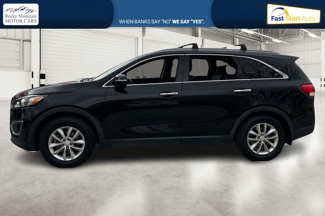 2017 Black Kia Sorento LX V6 2WD (5XYPG4A54HG) with an 3.3L V6 DOHC 24V engine, 6A transmission, located at 767 S State Road, Pleasant Grove, UT, 84062, (801) 785-1058, 40.354839, -111.736687 - Photo#6