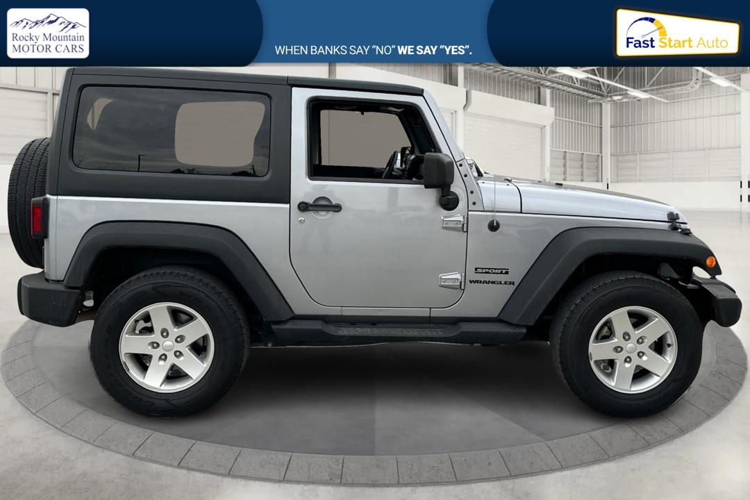2013 Silver Jeep Wrangler Sport 4WD (1C4GJWAG0DL) with an 3.6L V6 DOHC 24V FFV engine, Automatic, 5-Spd transmission, located at 767 S State Road, Pleasant Grove, UT, 84062, (801) 785-1058, 40.354839, -111.736687 - Photo#1