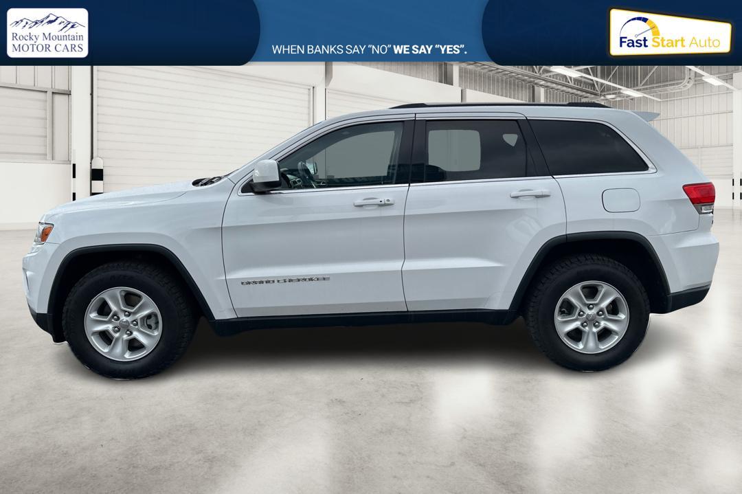 2014 White Jeep Grand Cherokee Laredo 4WD (1C4RJFAG2EC) with an 3.6L V6 DOHC 24V engine, 5-Speed Automatic transmission, located at 7755 State Street, Midvale, UT, 84047, (801) 753-9063, 40.610329, -111.892159 - Photo#6