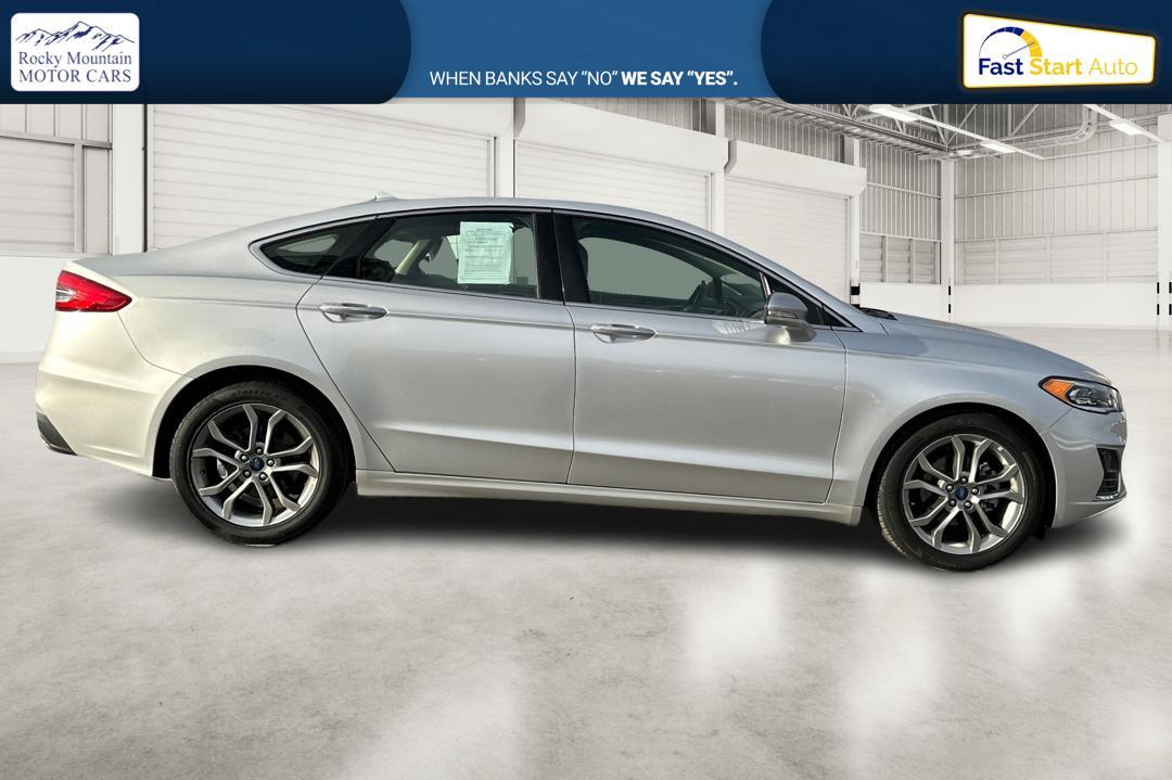 2019 Silver Ford Fusion SEL (3FA6P0CD1KR) with an 1.5L L4 DOHC 16V engine, 6A transmission, located at 7755 State Street, Midvale, UT, 84047, (801) 753-9063, 40.610329, -111.892159 - Photo#1