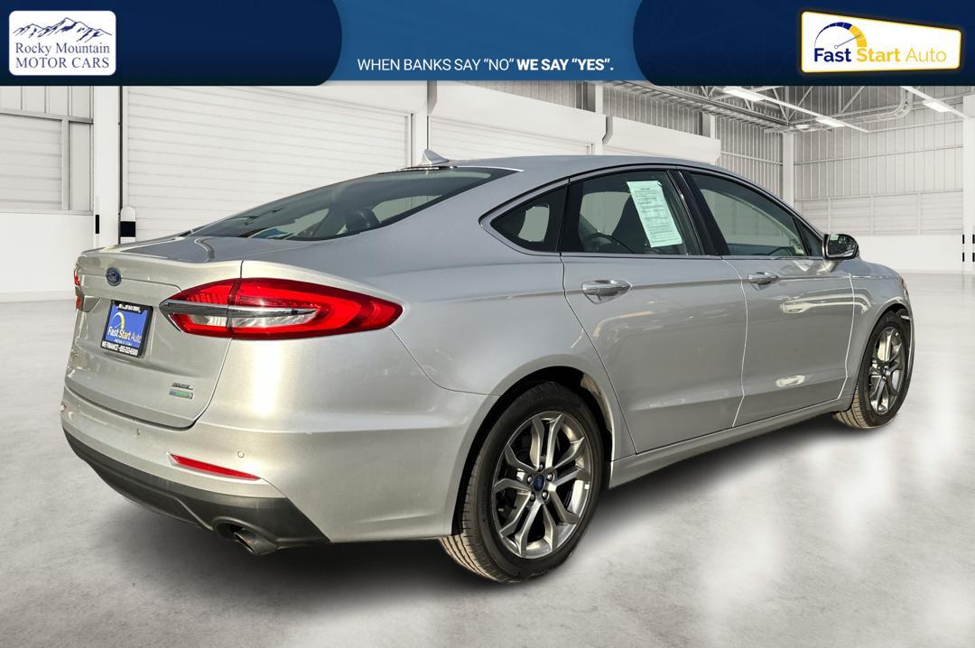 2019 Silver Ford Fusion SEL (3FA6P0CD1KR) with an 1.5L L4 DOHC 16V engine, 6A transmission, located at 7755 State Street, Midvale, UT, 84047, (801) 753-9063, 40.610329, -111.892159 - Photo#2