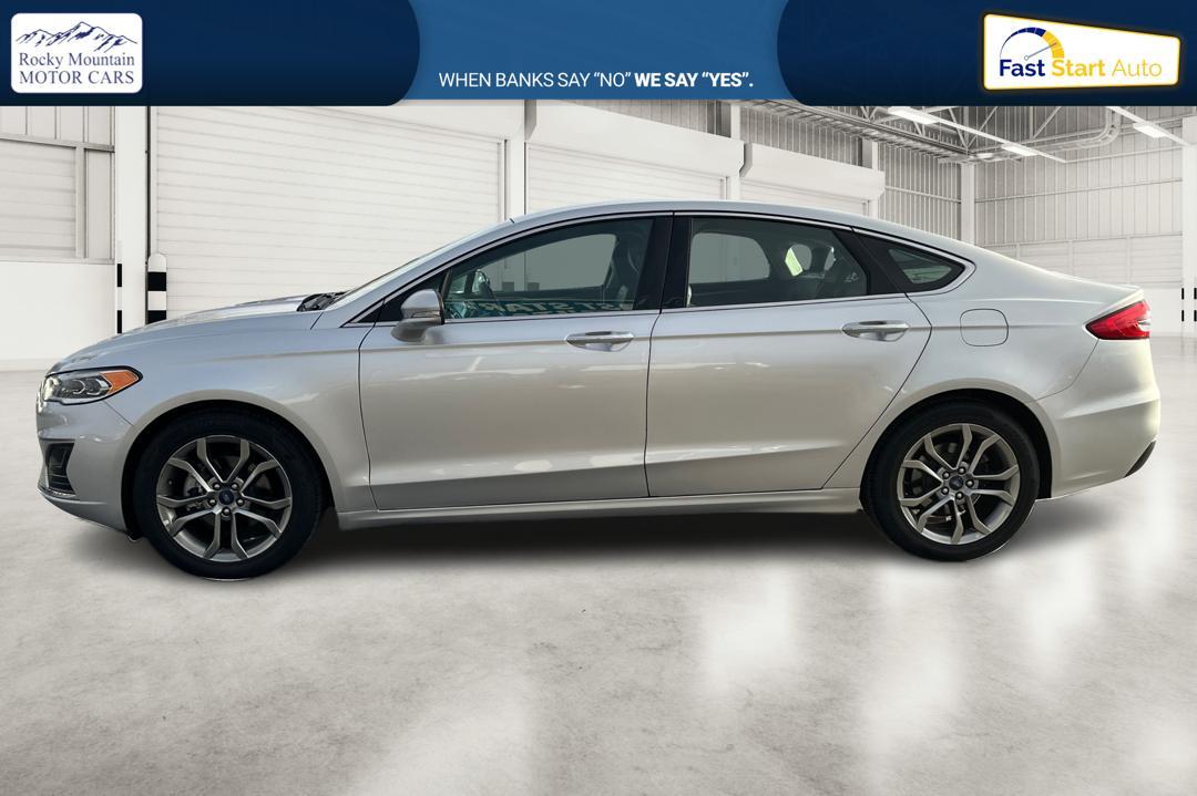 2019 Silver Ford Fusion SEL (3FA6P0CD1KR) with an 1.5L L4 DOHC 16V engine, 6A transmission, located at 7755 State Street, Midvale, UT, 84047, (801) 753-9063, 40.610329, -111.892159 - Photo#6