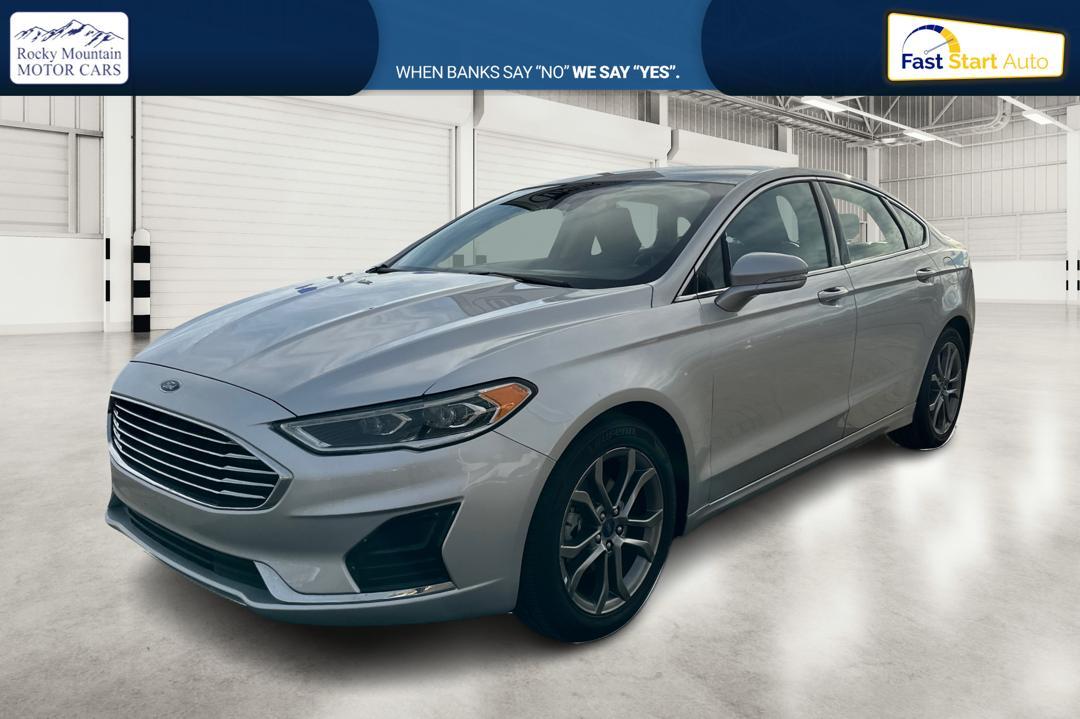 2019 Silver Ford Fusion SEL (3FA6P0CD1KR) with an 1.5L L4 DOHC 16V engine, 6A transmission, located at 7755 State Street, Midvale, UT, 84047, (801) 753-9063, 40.610329, -111.892159 - Photo#8