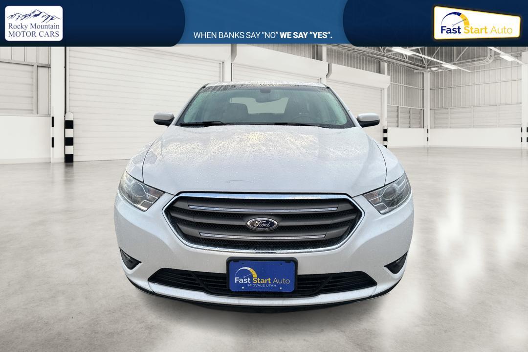 2015 White Ford Taurus SEL FWD (1FAHP2E87FG) with an 3.5L V6 DOHC 24V engine, 6-Speed Automatic transmission, located at 7755 State Street, Midvale, UT, 84047, (801) 753-9063, 40.610329, -111.892159 - Photo#9