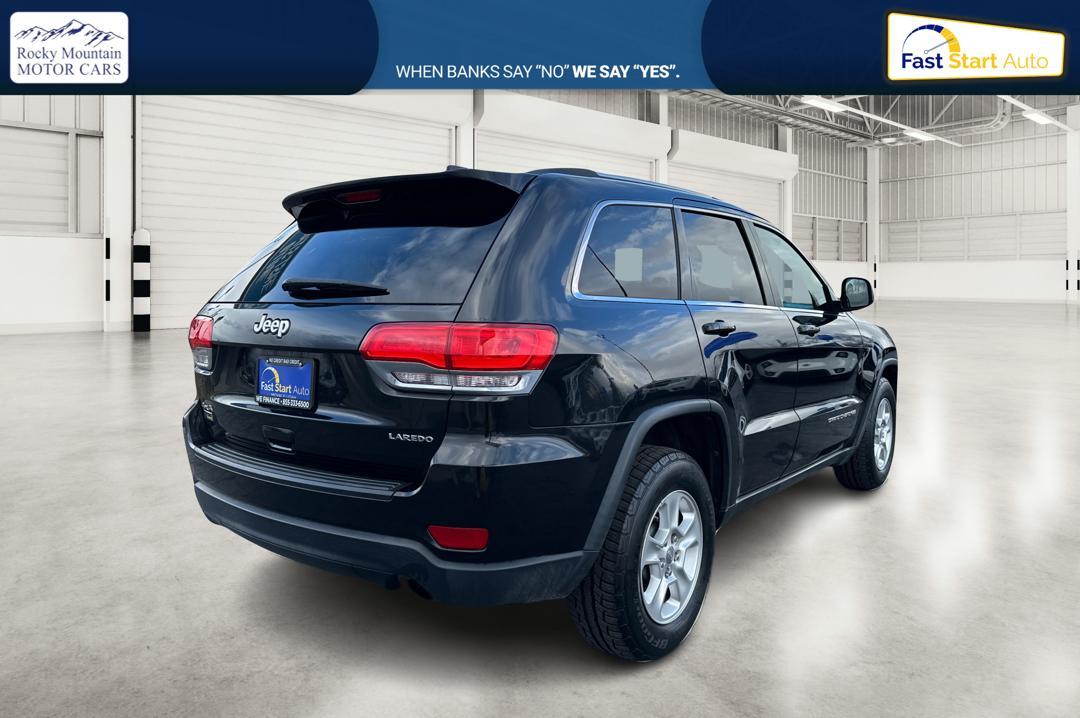 2014 Black Jeep Grand Cherokee Laredo 4WD (1C4RJFAG1EC) with an 3.6L V6 DOHC 24V engine, 5-Speed Automatic transmission, located at 7755 State Street, Midvale, UT, 84047, (801) 753-9063, 40.610329, -111.892159 - Photo#2