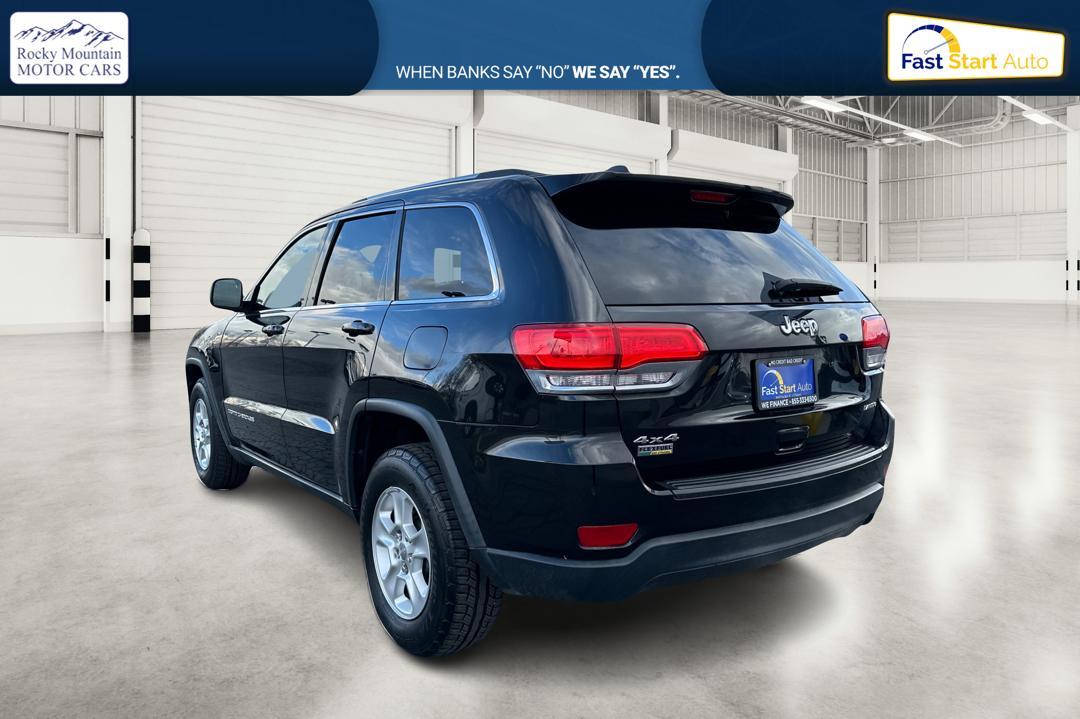 2014 Black Jeep Grand Cherokee Laredo 4WD (1C4RJFAG1EC) with an 3.6L V6 DOHC 24V engine, 5-Speed Automatic transmission, located at 7755 State Street, Midvale, UT, 84047, (801) 753-9063, 40.610329, -111.892159 - Photo#5