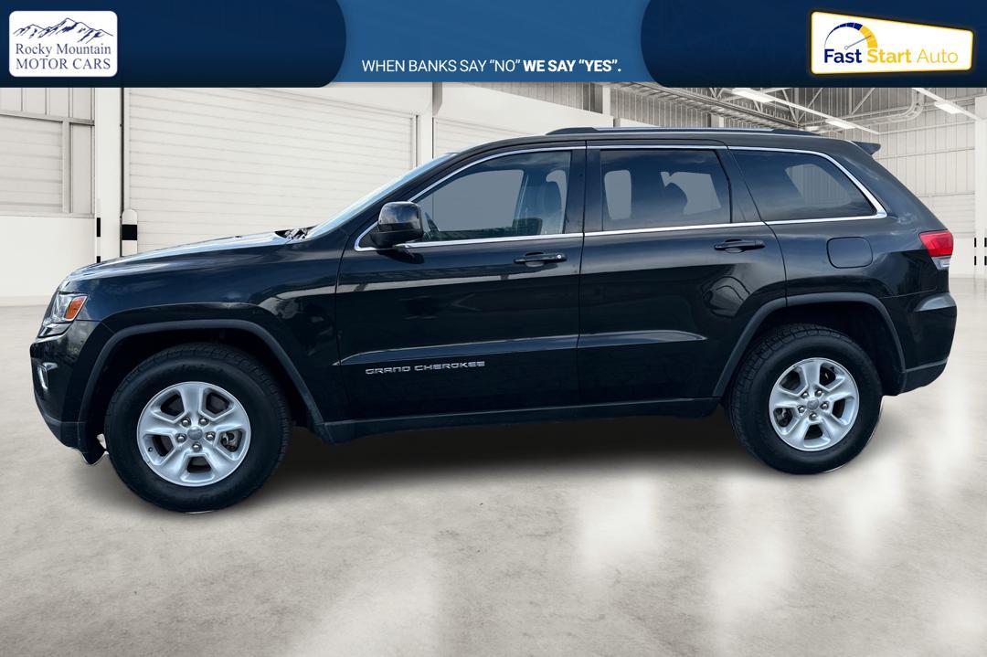 2014 Black Jeep Grand Cherokee Laredo 4WD (1C4RJFAG1EC) with an 3.6L V6 DOHC 24V engine, 5-Speed Automatic transmission, located at 7755 State Street, Midvale, UT, 84047, (801) 753-9063, 40.610329, -111.892159 - Photo#6