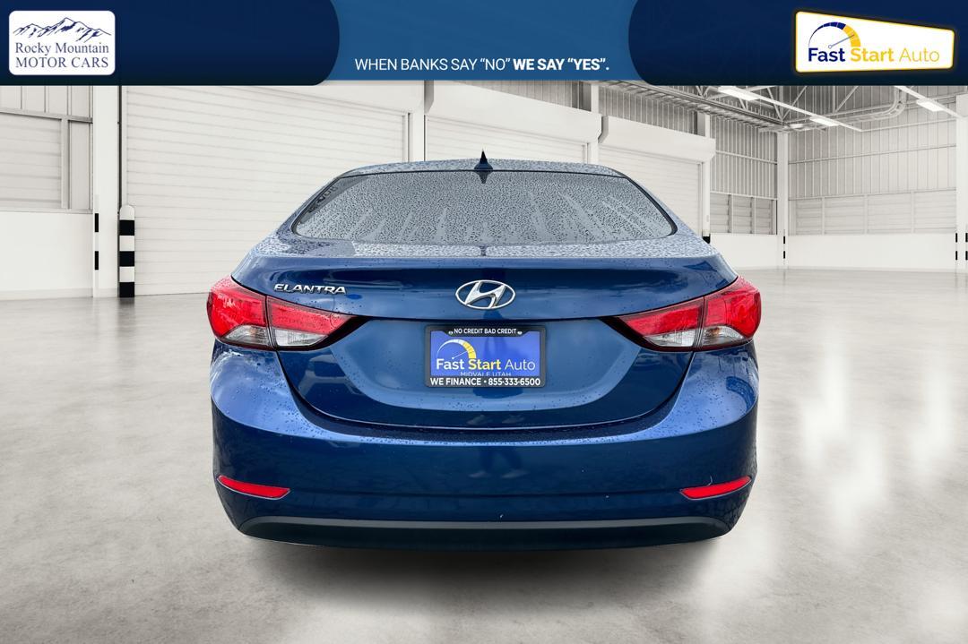 2015 Blue Hyundai Elantra Limited (5NPDH4AE3FH) with an 1.8L L4 DOHC 16V engine, 6-Speed Automatic transmission, located at 7755 State Street, Midvale, UT, 84047, (801) 753-9063, 40.610329, -111.892159 - Photo#4