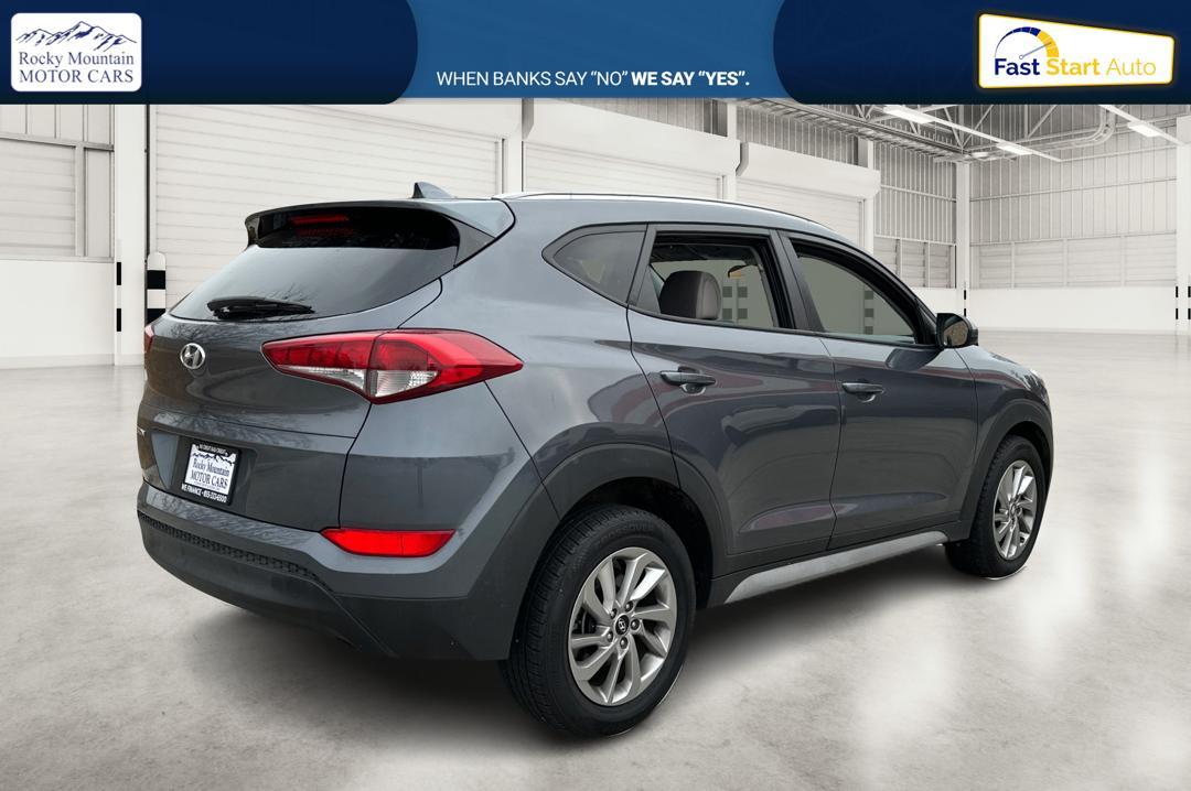 2018 Gray Hyundai Tucson SE (KM8J33A48JU) with an 2.0L L4 DOHC 16V engine, 6A transmission, located at 344 S Washington Blvd, Ogden, UT, 84404, (801) 399-1799, 41.255482, -111.970848 - Photo#2