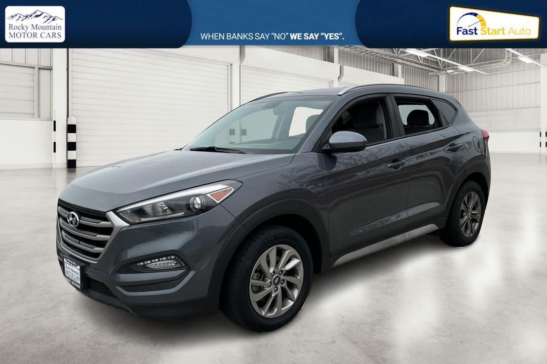 2018 Gray Hyundai Tucson SE (KM8J33A48JU) with an 2.0L L4 DOHC 16V engine, 6A transmission, located at 344 S Washington Blvd, Ogden, UT, 84404, (801) 399-1799, 41.255482, -111.970848 - Photo#8