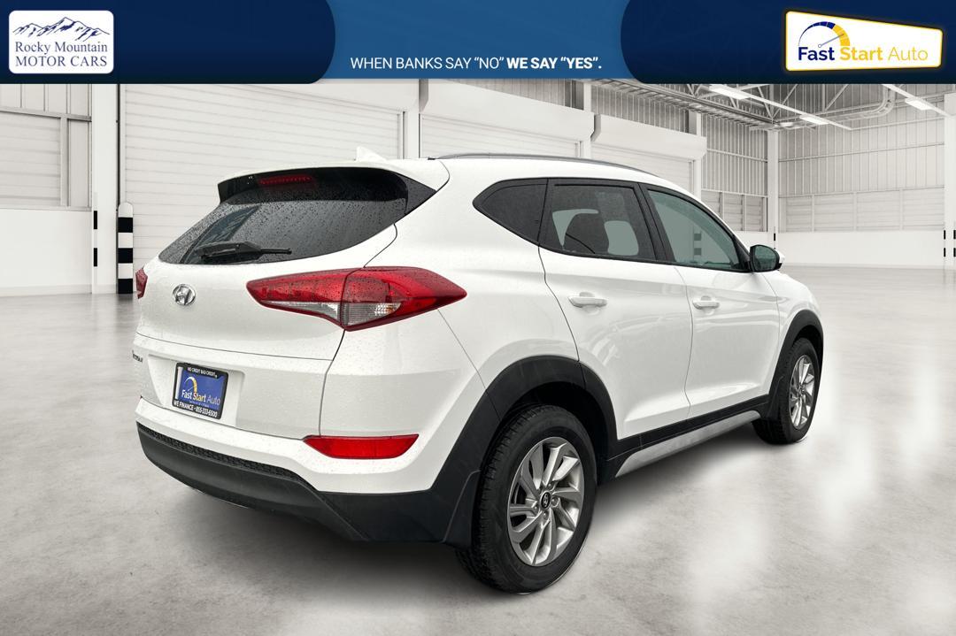 2018 White Hyundai Tucson SE (KM8J33A48JU) with an 2.0L L4 DOHC 16V engine, 6A transmission, located at 7755 State Street, Midvale, UT, 84047, (801) 753-9063, 40.610329, -111.892159 - Photo#2