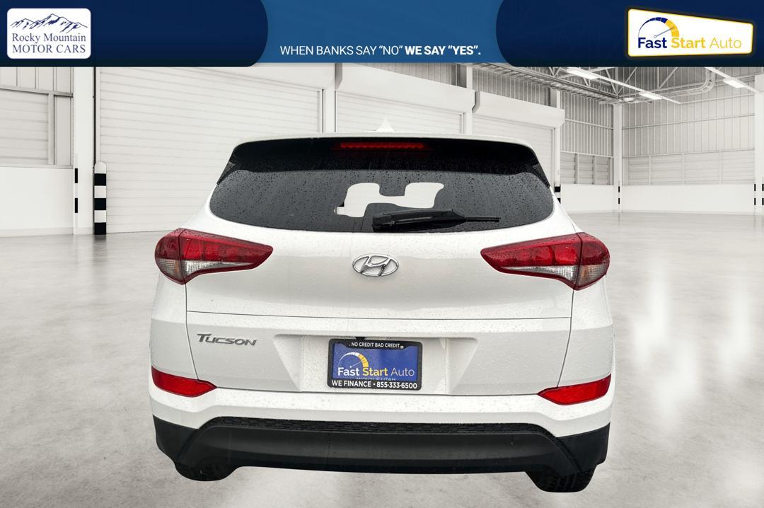 2018 White Hyundai Tucson SE (KM8J33A48JU) with an 2.0L L4 DOHC 16V engine, 6A transmission, located at 7755 State Street, Midvale, UT, 84047, (801) 753-9063, 40.610329, -111.892159 - Photo#4