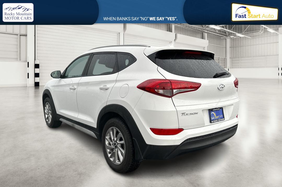 2018 White Hyundai Tucson SE (KM8J33A48JU) with an 2.0L L4 DOHC 16V engine, 6A transmission, located at 7755 State Street, Midvale, UT, 84047, (801) 753-9063, 40.610329, -111.892159 - Photo#5