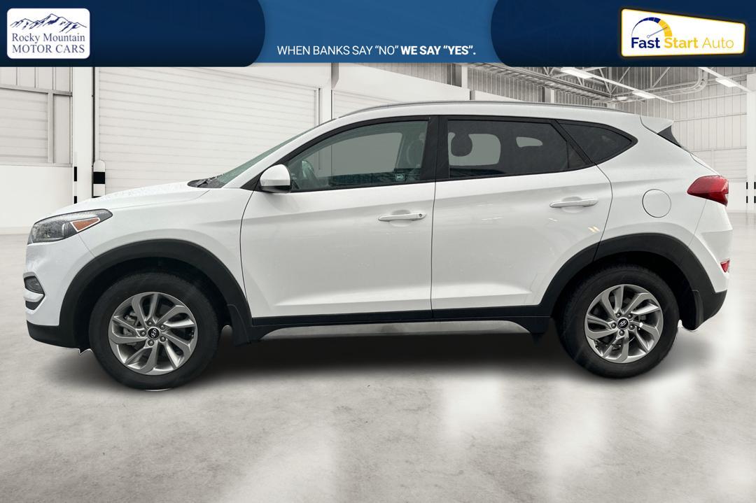 2018 White Hyundai Tucson SE (KM8J33A48JU) with an 2.0L L4 DOHC 16V engine, 6A transmission, located at 7755 State Street, Midvale, UT, 84047, (801) 753-9063, 40.610329, -111.892159 - Photo#6