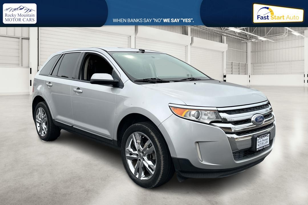 2014 Silver Ford Edge SEL FWD (2FMDK3JC3EB) with an 3.5L V6 DOHC 24V engine, 6-Speed Automatic transmission, located at 344 S Washington Blvd, Ogden, UT, 84404, (801) 399-1799, 41.255482, -111.970848 - Photo#0