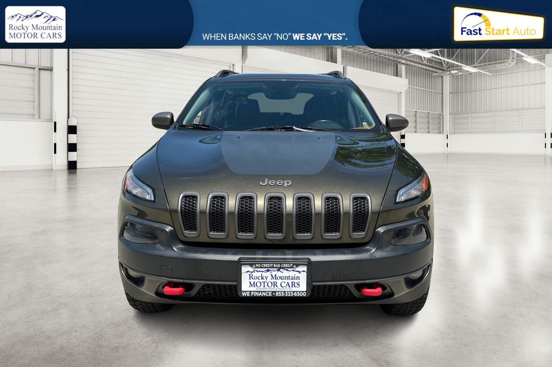 2015 Green Jeep Cherokee Trailhawk 4WD (1C4PJMBSXFW) with an 3.2L V6 DOHC 24V engine, 9-Speed Automatic transmission, located at 767 S State Road, Pleasant Grove, UT, 84062, (801) 785-1058, 40.354839, -111.736687 - Photo#9